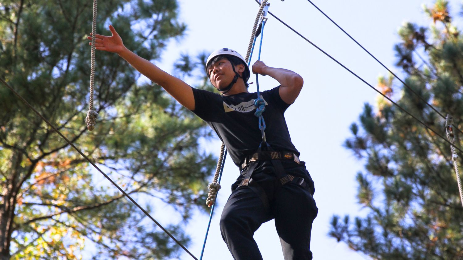 student on the challenge course