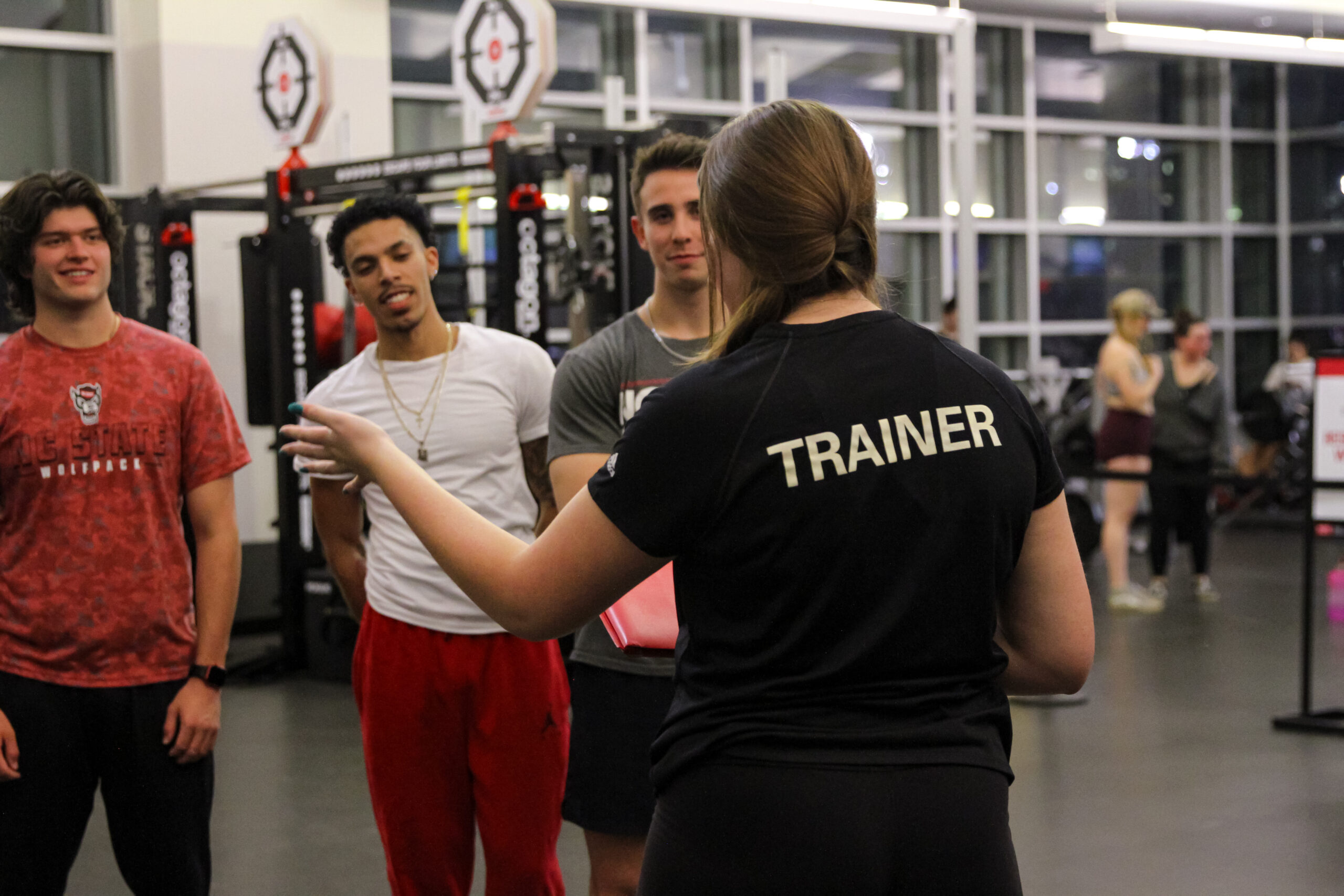 Trainer giving an orientation to students
