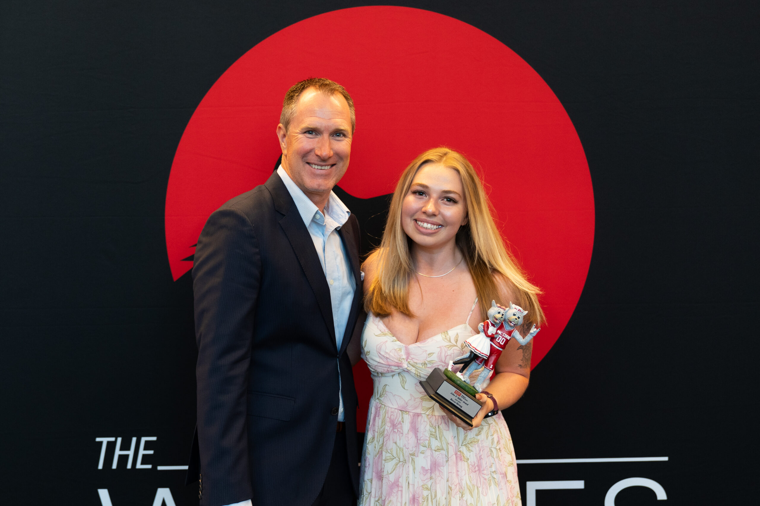 Eric Hawkes with Wolfie award recipient Becca Strong